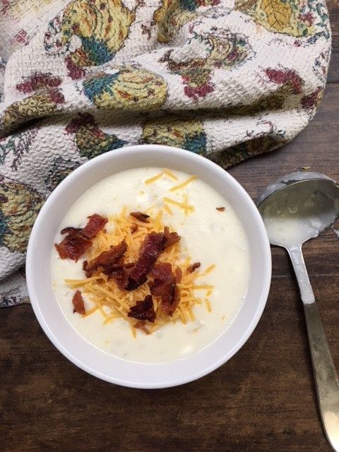 Crock Pot Potato Soup with Cream Cheese is an easy meal to fix for the entire family. It feeds at least 10 people and is a filling meal for the entire family. It's a comforting recipe that you will love.