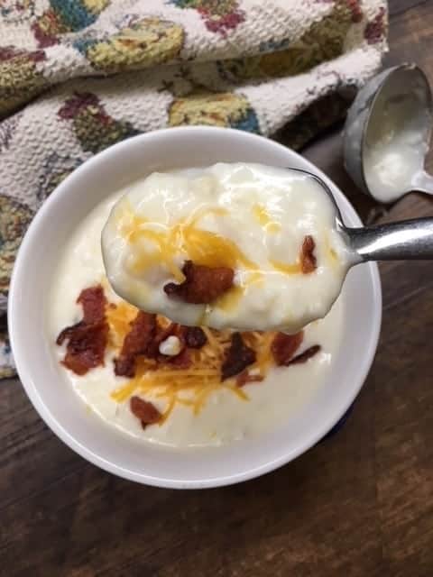 Crock Pot Potato Soup with Cream Cheese is an easy meal to fix for the entire family. It feeds at least 10 people and is a filling meal for the entire family. It's a comforting recipe that you will love.