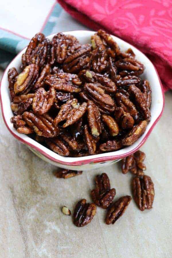 Stovetop Candied Pecans are a delicious treat for the holidays. The candied pecans are an easy recipe to make and are the perfect Christmas dessert.