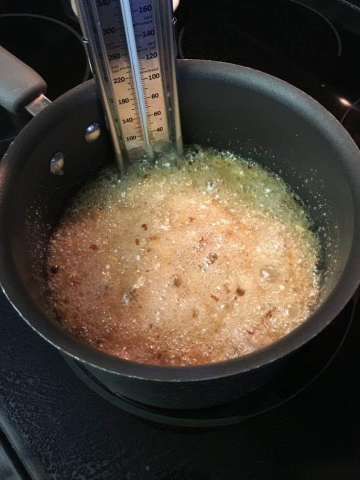 I love this easy recipe for homemade old fashioned peanut brittle. The recipe makes a great gift for teachers, friends, or anyone around the holidays.