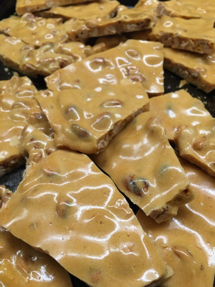 Easy Old Fashioned Peanut Brittle is a great holiday Christmas treat to make for friends, family, neighbors, and teachers. It's a cinch to make, and is just about the cheapest treat around.