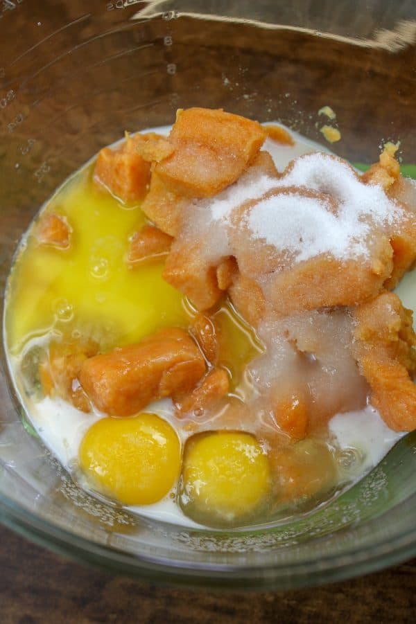 Picture of eggs, butter, sugar, and yams in a bowl