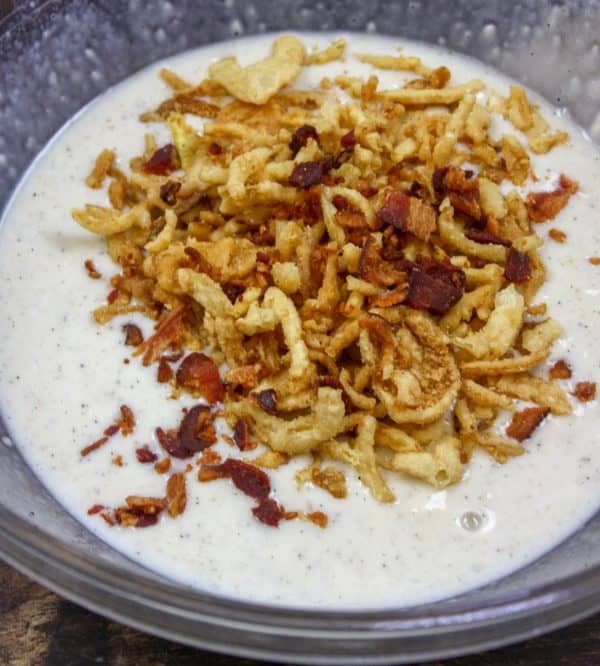 Picture of crispy fried onions and bacon in mushroom soup.