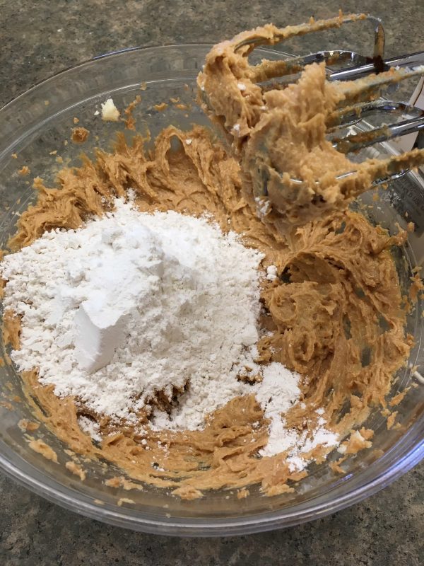 Picture of flour in a peanut butter dough mixture