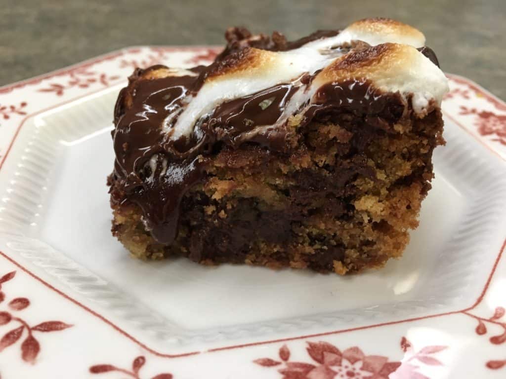 The Chocolate Mountain Marshmallow Cookie Bar is so simple and easy to make. It takes longer to cool off than to make.