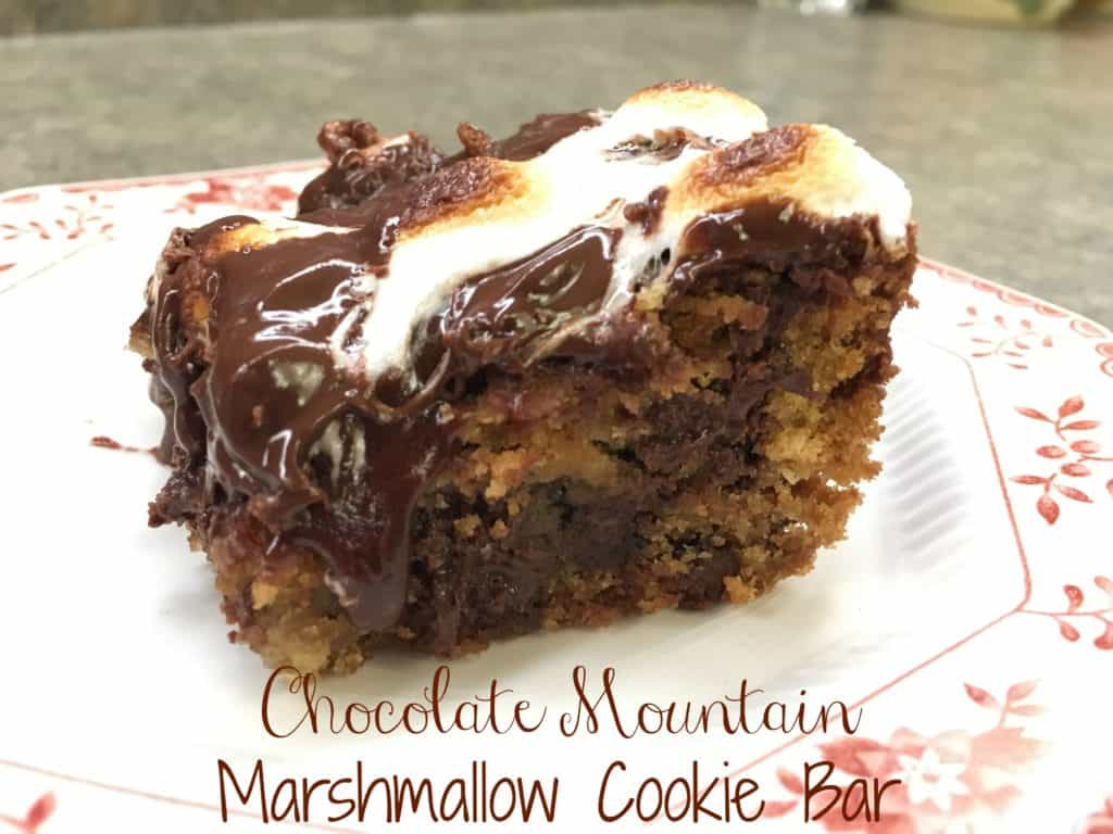 The Chocolate Mountain Marshmallow Cookie Bar is so simple and easy to make. It takes longer to cool off than to make. 