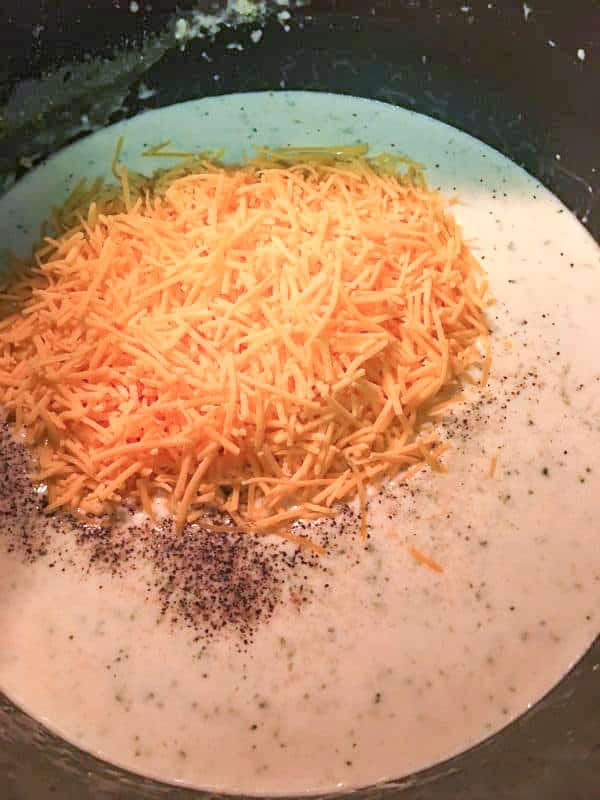 Broccoli cheddar soup in a saucepan