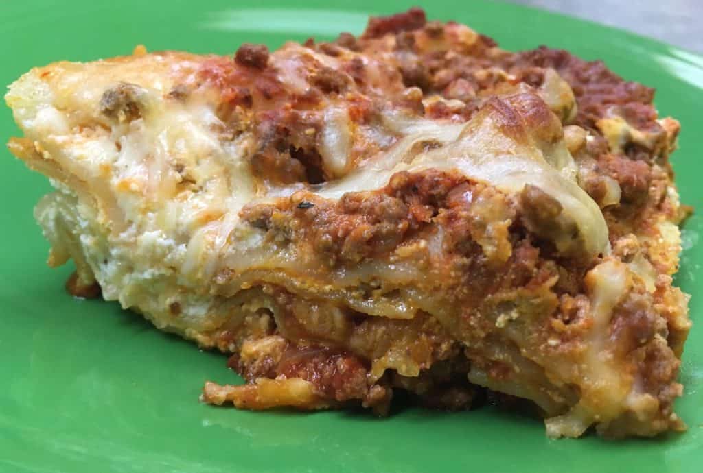 If you're looking for a delicious meal that will feed and fill up your hungry family for a small amount, try this cheap hearty homemade beef lasagna. The recipe is enough for more than one meal, keeping money in your pocket. 