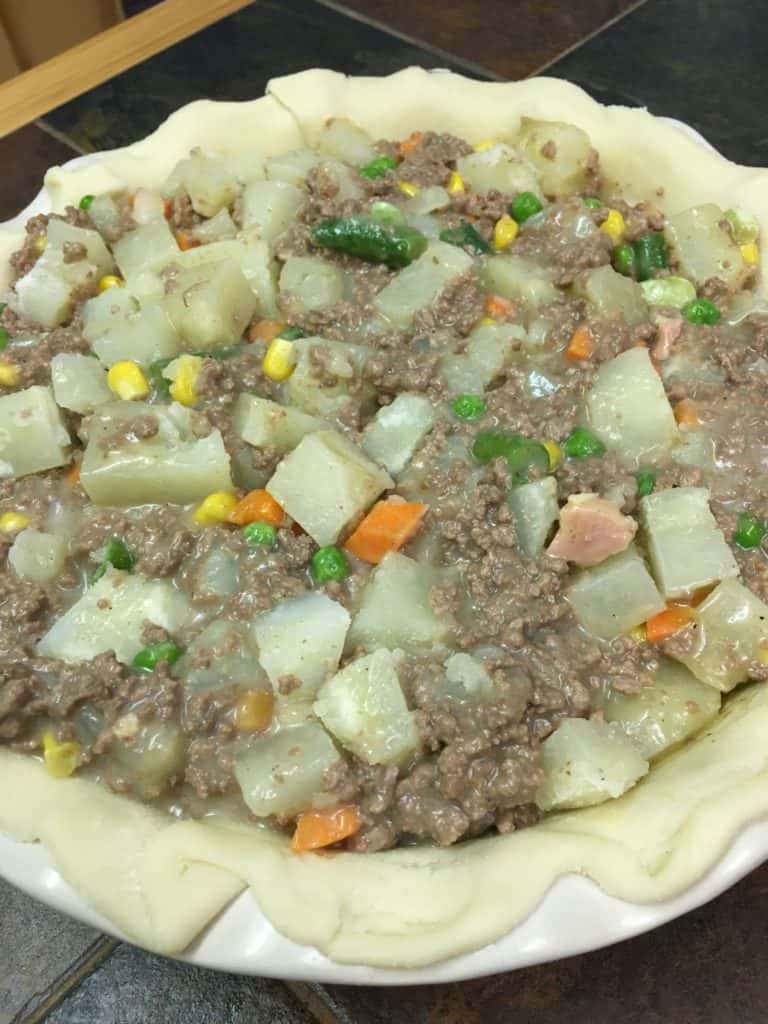 It's easy to make a beef pot pie with frozen ingredients, and two premade pie crusts.