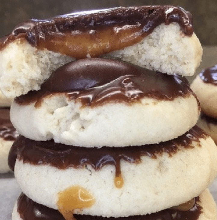 I love Twix candy bars, and I love these easy shortbread Twix Thumbprint Cookies. They taste just like the candy bar and are super easy to make.