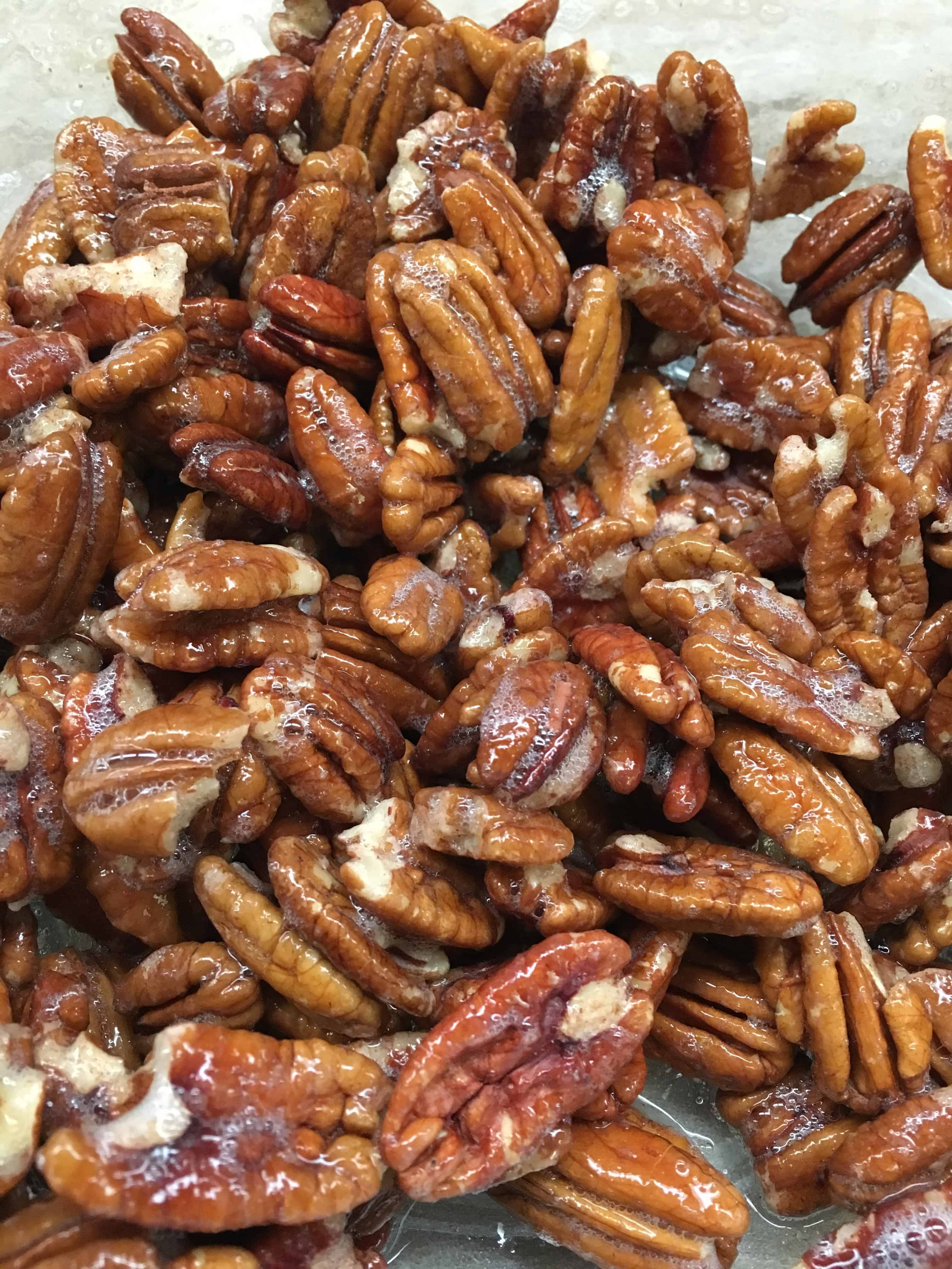 Easy and Quick Cinnamon Candied Pecans with brown sugar is a great holiday treat for Christmas or Thanksgiving.