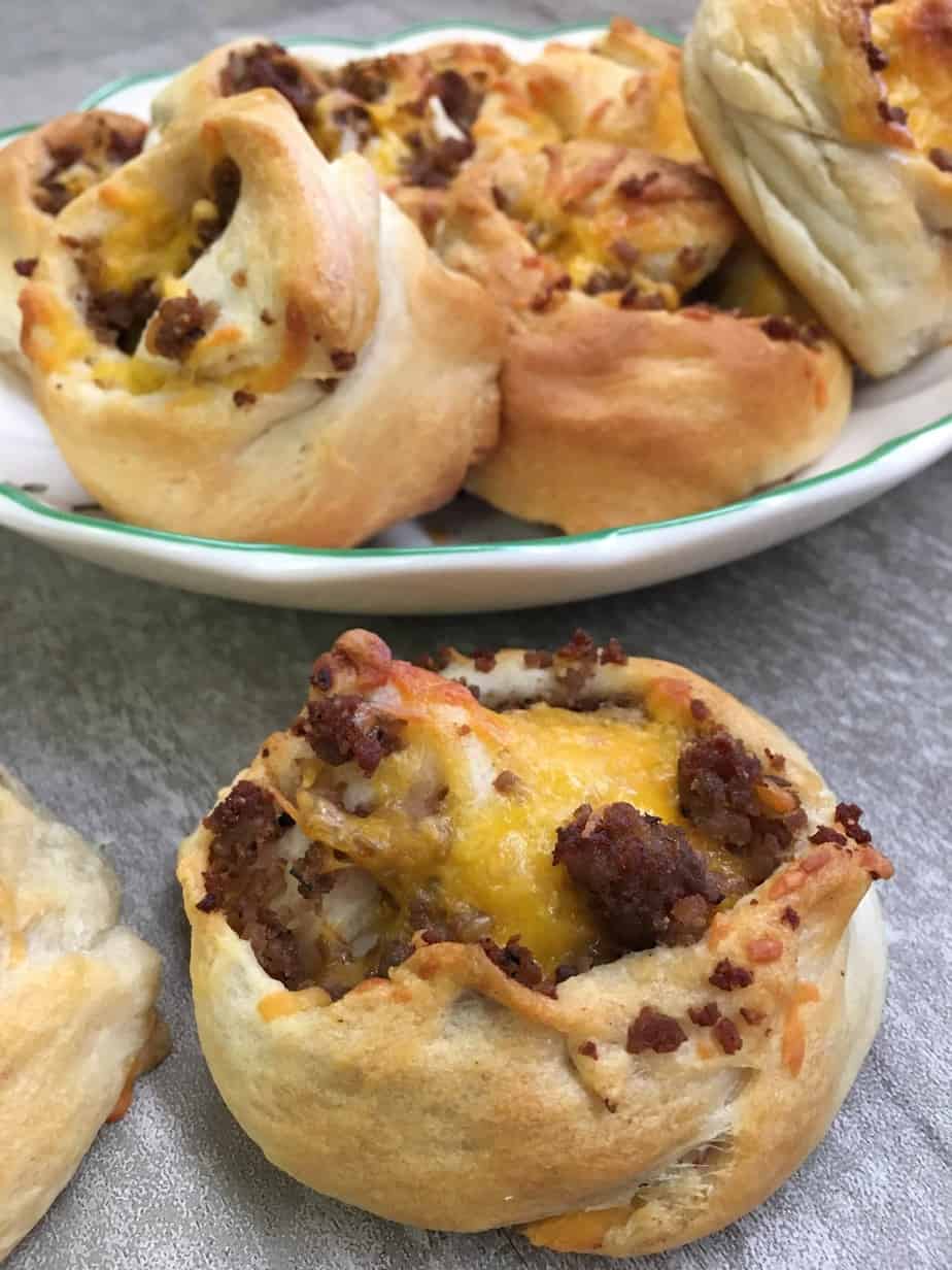 Easy Sausage Crescent Rolls are a great breakfast treat for guests. You can make the sausage crescent rolls ahead of time, freeze them, and eat them when you're ready.