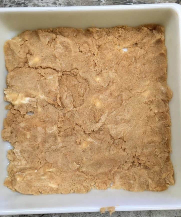 Butter and brown sugar pressed into a casserole dish