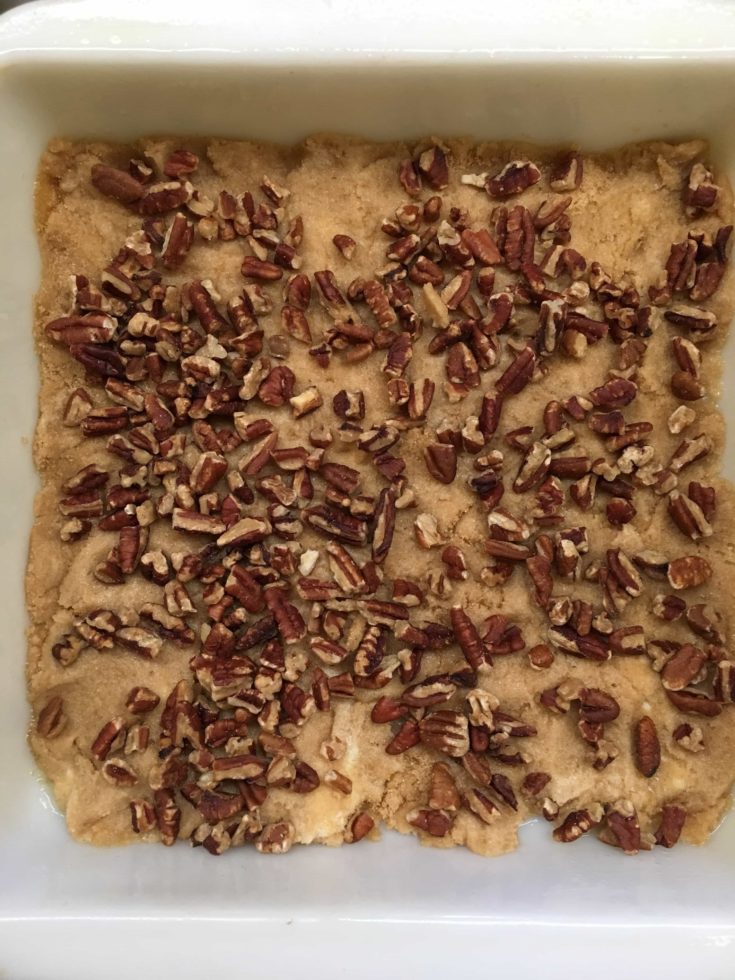 Pecans and brown sugar in a casserole dish