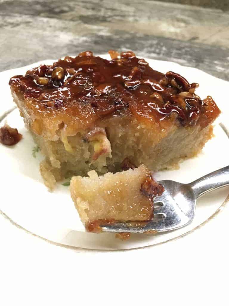 Banana bread on a plate with a fork