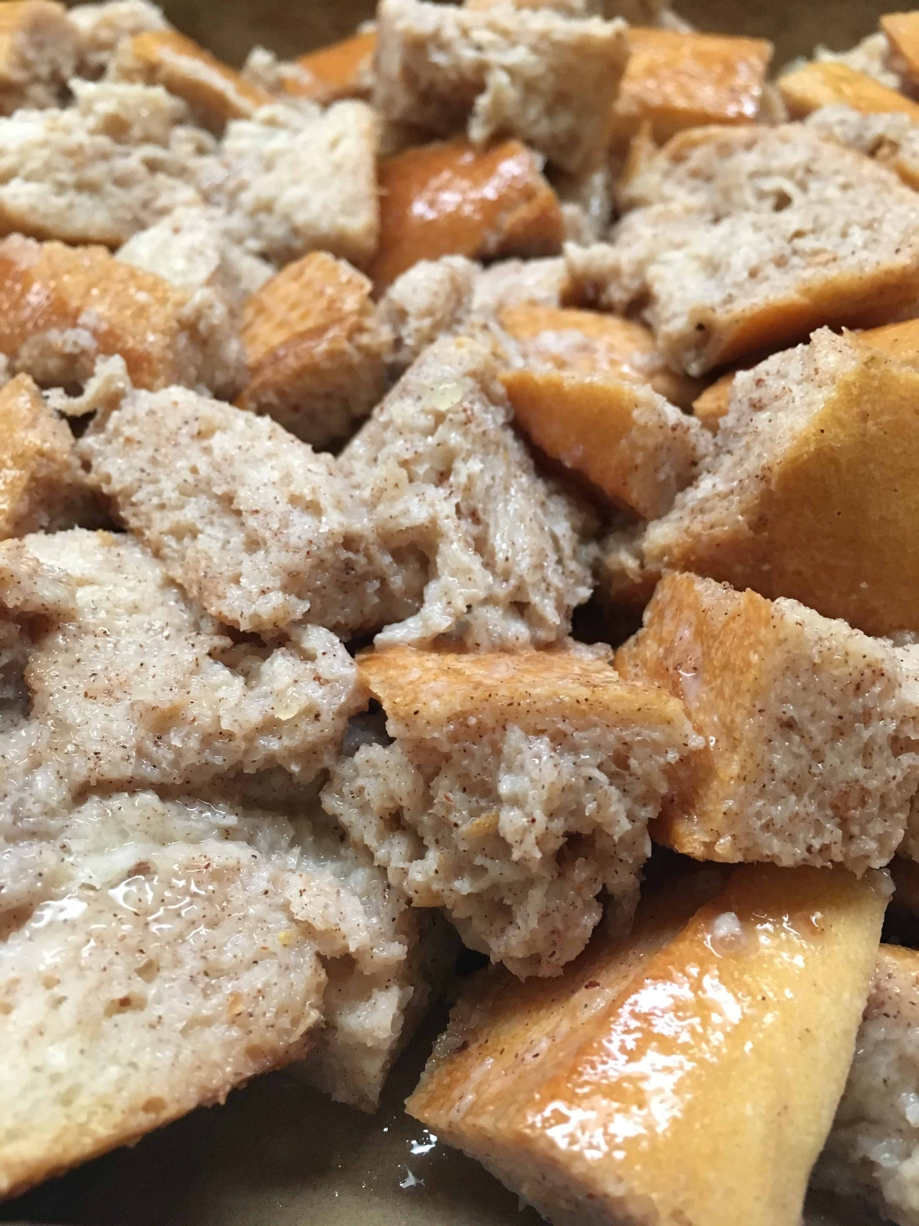 Cinnamon Spiced Bread Pudding with Butter Sauce is an easy and cheap treat for the Christmas holiday. I love the spice-filled taste with the creamy sauce.