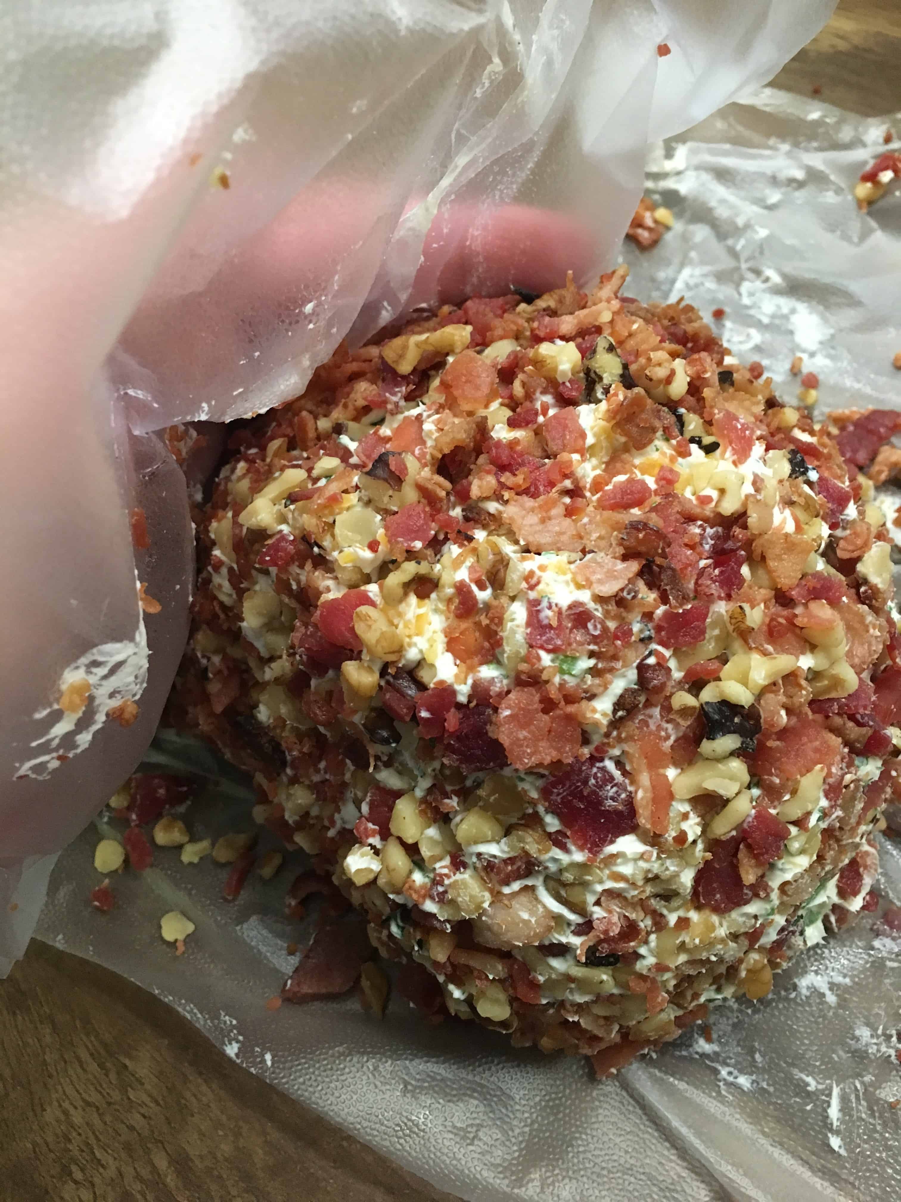 Easy Holiday Bacon Ranch and Walnut Cheeseball is a classic holiday appetizer. The cheeseball is the perfect food to bring to any party. I use pre made real bacon to make it quick and get it ready to eat.