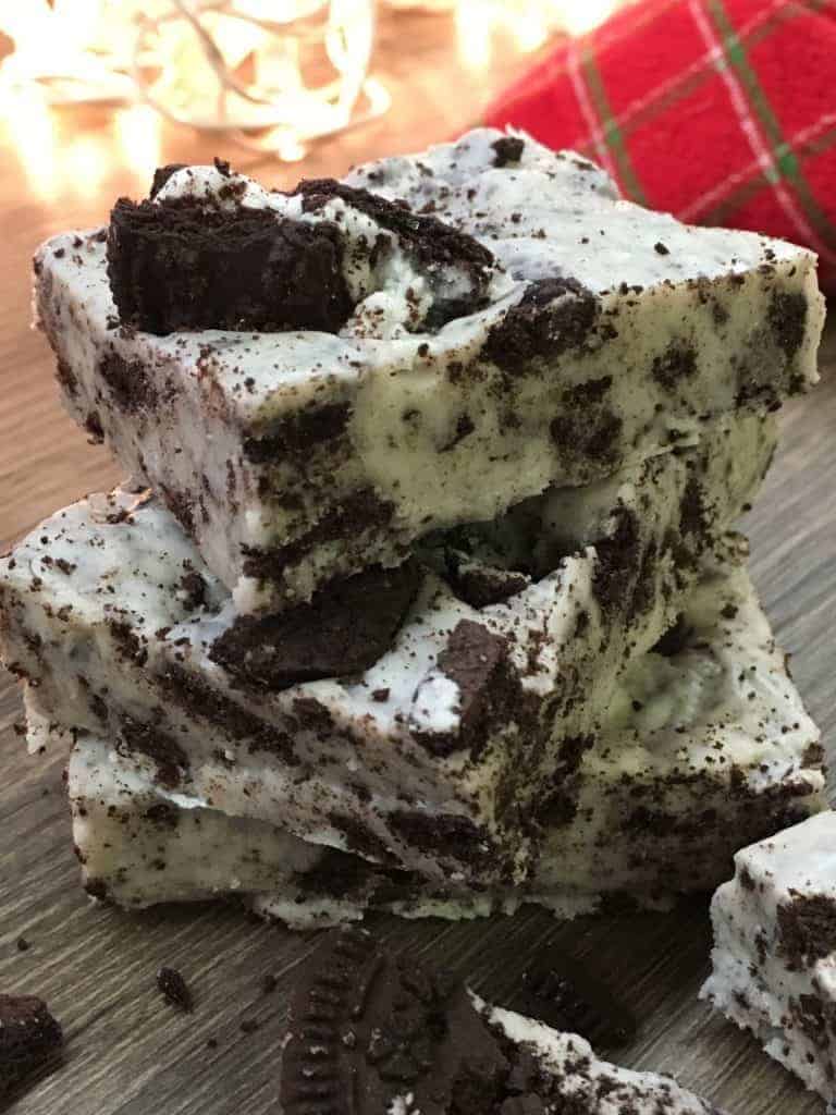 Five Minute Fudge is a quick microwave recipe that only requires three ingredients. You can add anything you would like to the ingredients, including Oreos, Heath Bars, M&M's, and more. It's a delicious holiday Christmas treat that everyone will love. 