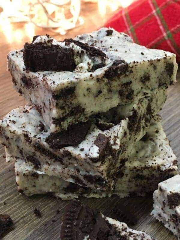 Five Minute Fudge is a quick microwave recipe that only requires three ingredients. You can add anything you would like to the ingredients, including Oreos, Heath Bars, M&M's, and more. It's a delicious holiday Christmas treat that everyone will love.