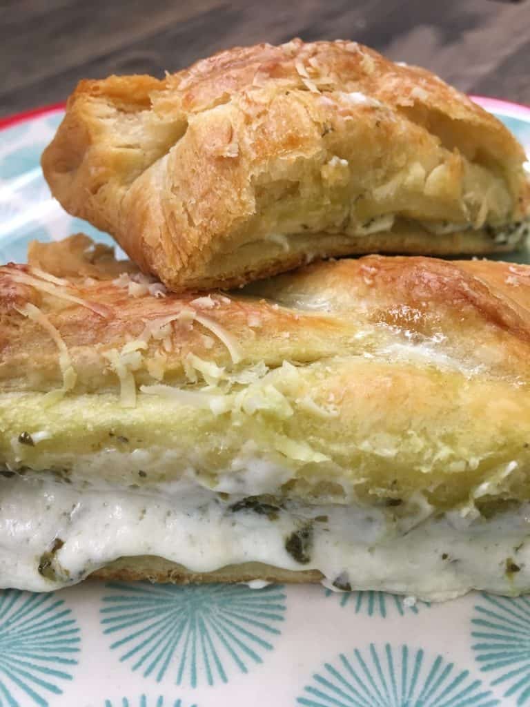 The Cream Cheese Pesto Crescent Roll Braid is a delicious appetizer to make for parties. 