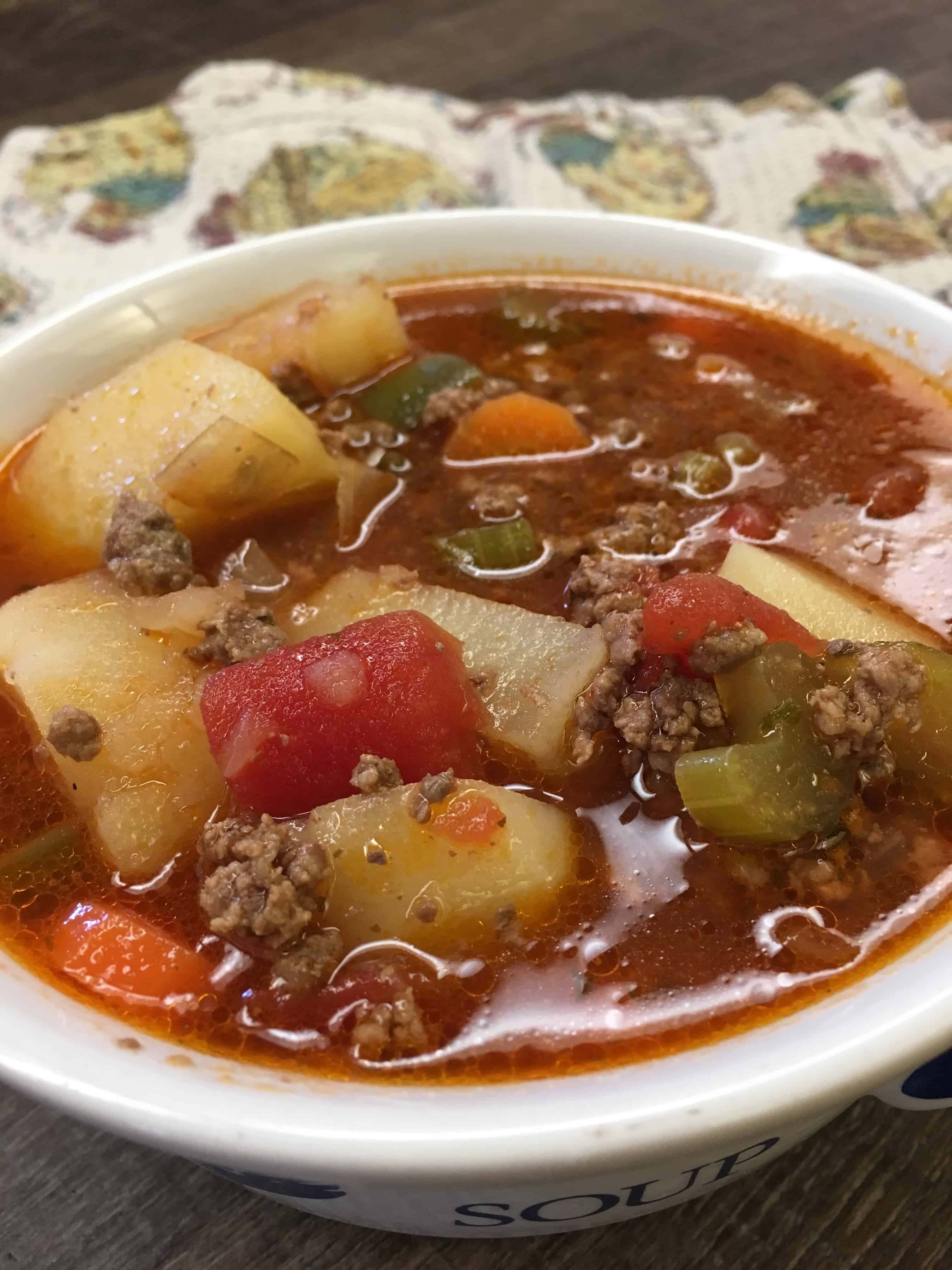 You are going to love this hamburger and vegetable soup. It's the perfect soup recipe to warm you up in the cold weather and it's easy to make. The hamburger and veggie soup recipe makes a large pot that will feed a family of 8, or you'll have plenty of leftovers. This is a very inexpensive, cheap meal that costs less than $15.