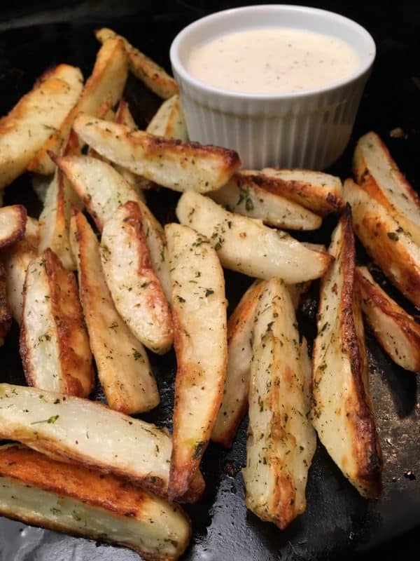 Oven Baked Potato Wedges recipe is a delicious and easy side dish to fix. The seasoned oven baked potato wedges recipe is perfect for supper or as an appetizer for football games, parties, and as a snack.