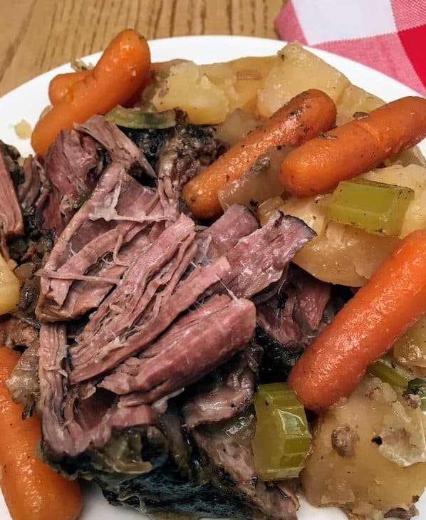 Slow Cooker Pot Roast is an easy recipe to fix for dinner. The delicious recipe, with plenty of seasoning, will feed a family of six with ease.