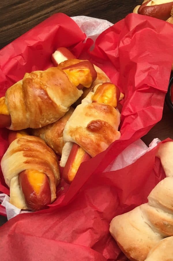 5 Hot Dog Recipes for Parties are the perfect appetizers for any gathering. The hot dog recipes work for football games, birthday parties, and any gathering where you want to offer budget-friendly foods and have something good to eat.