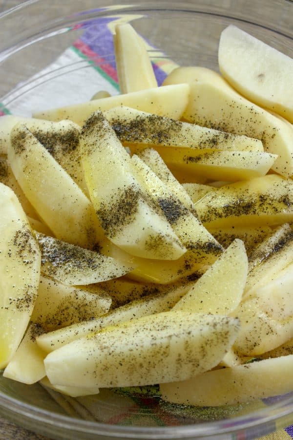 Picture of salt and pepper on potatoes