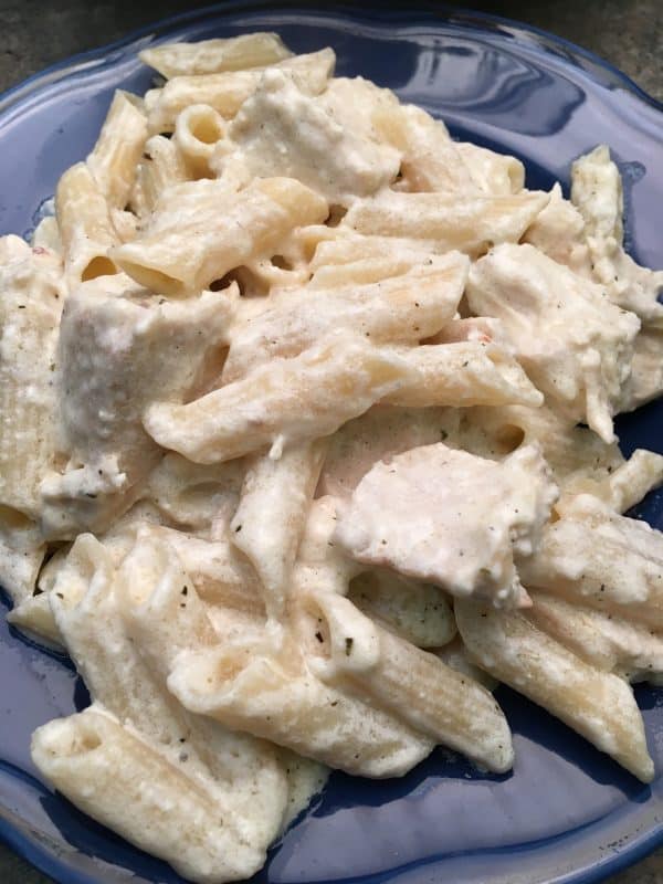 Chicken and Noodles with Homemade Alfredo Sauce is an easy meal to make for dinner. The delicious and cheesy homemade sauce is made with parmesan and cream cheese.