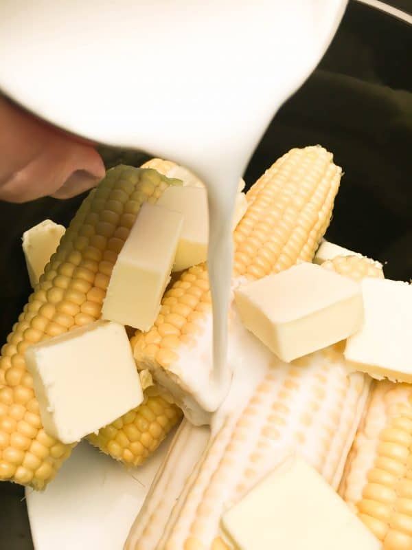 Crock Pot Corn on the Cob with Coconut Milk is an easy recipe. The coconut milk and butter give the corn and soft and buttery taste. The budget-friendly side dish comes out perfect in the slow cooker.