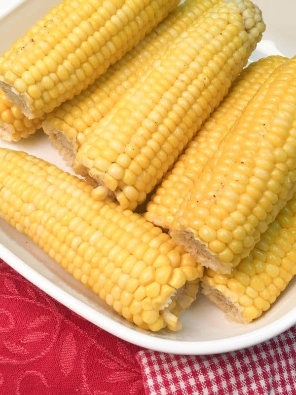 Crock Pot Corn on the Cob with Coconut Milk is an easy recipe. The coconut milk and butter give the corn and soft and buttery taste. The budget-friendly side dish comes out perfect in the slow cooker.