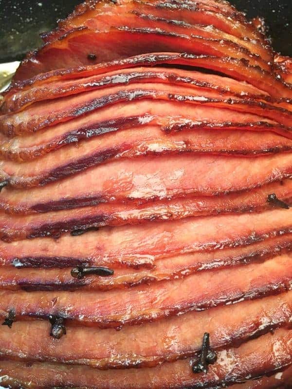 Baked Ham with Brown Sugar Glaze is a delicious and easy recipe for any holiday including Easter, Christmas, and Thanksgiving.
