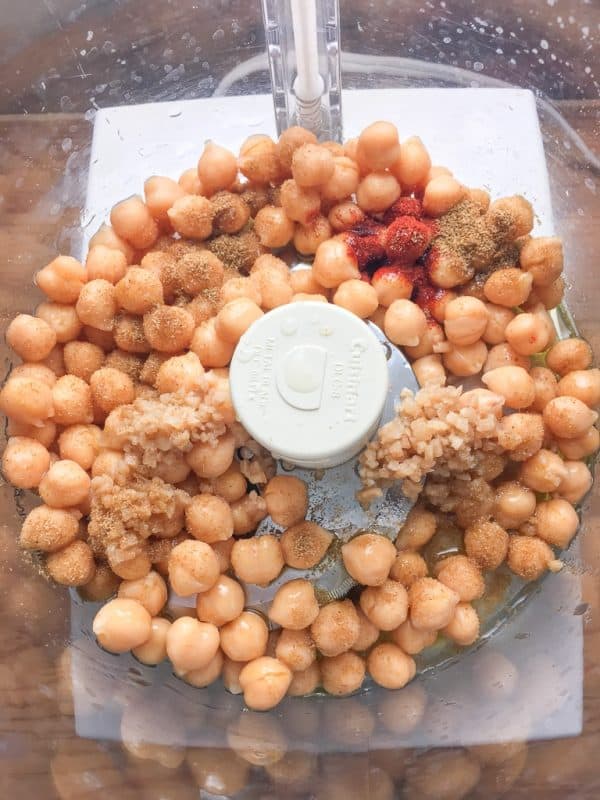 If you're wondering how to make hummus, this is an easy recipe that includes garlic, cumin, paprika, and chickpeas. 