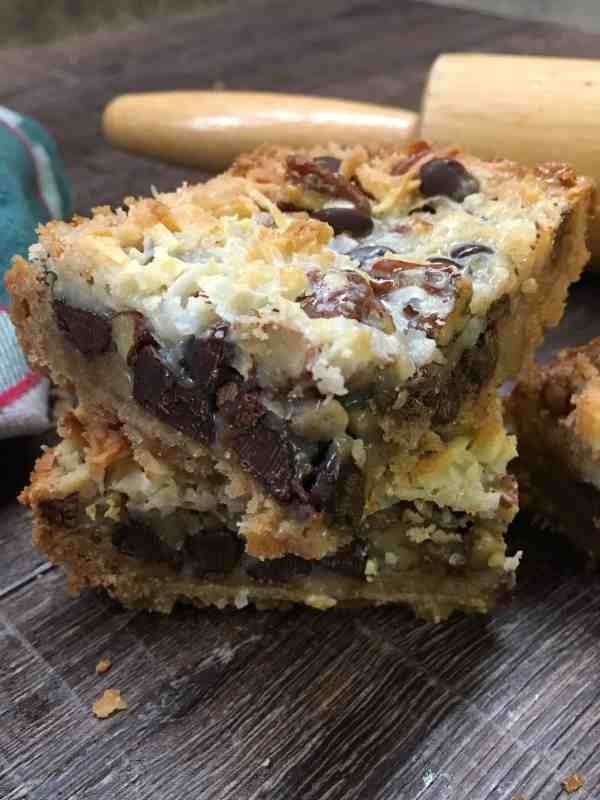 Hello Dolly Bars are a delicious dessert with coconut, chocolate chips, sweetened condensed milk, and a graham cracker crust.