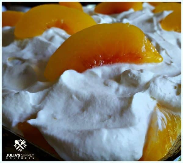 Peaches and Cream Poke Cake - Julia's Simply Southern