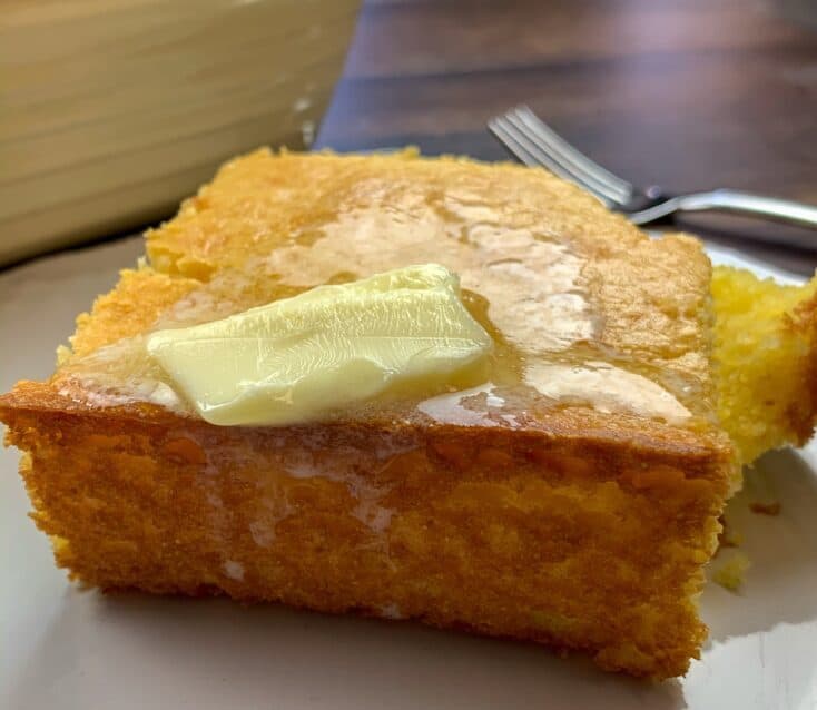 Butter melting on top of a slice of Jiffy Cornbread