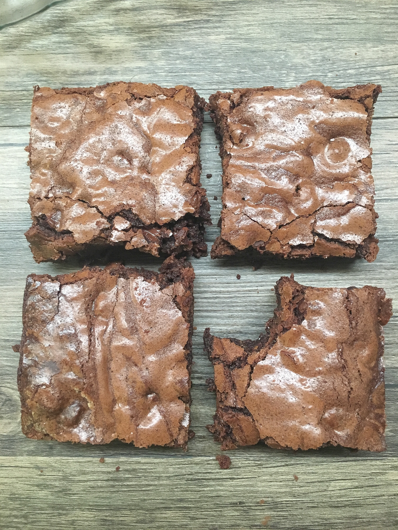 Easy homemade brownies with chocolate chips on a counter.