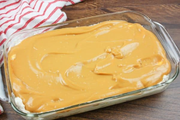 Butterscotch pudding in a large casserole dish.