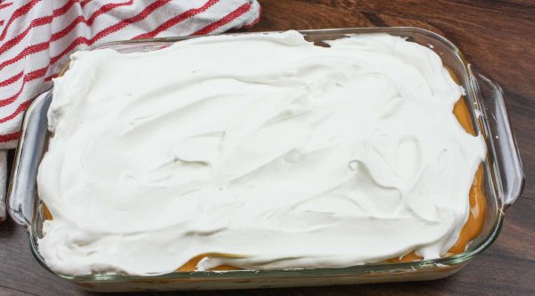 Whipped topping on butterscotch pudding dessert