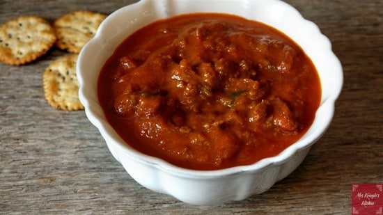 Picture of chili in a white bowl.