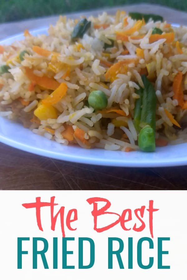 Picture of fried rice and veggies on a plate