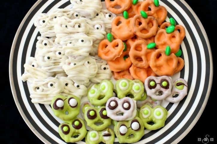 Picture of pretzels dipped in chocolate and looking like Halloween treats!