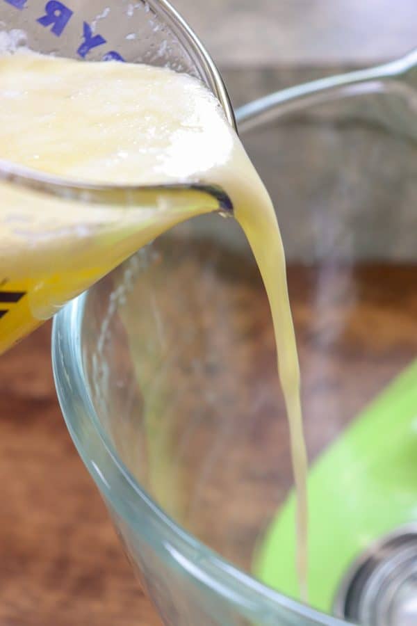 Picture of melted butter pouring down into a bowl.