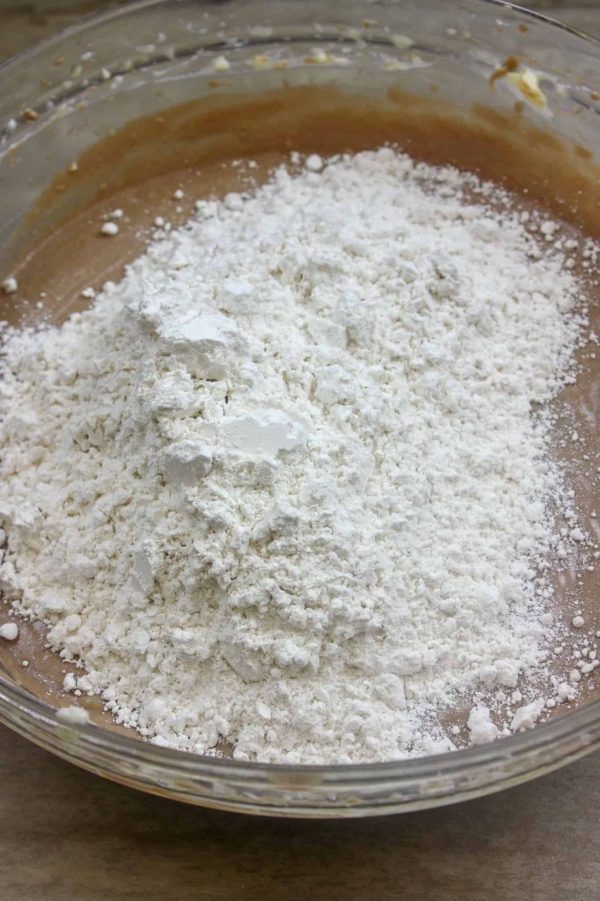 Picture of flour in a bowl with a pound cake batter.