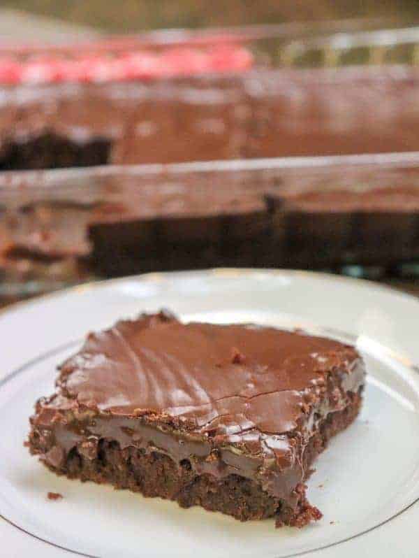 Picture of a brownie with a fudge frosting