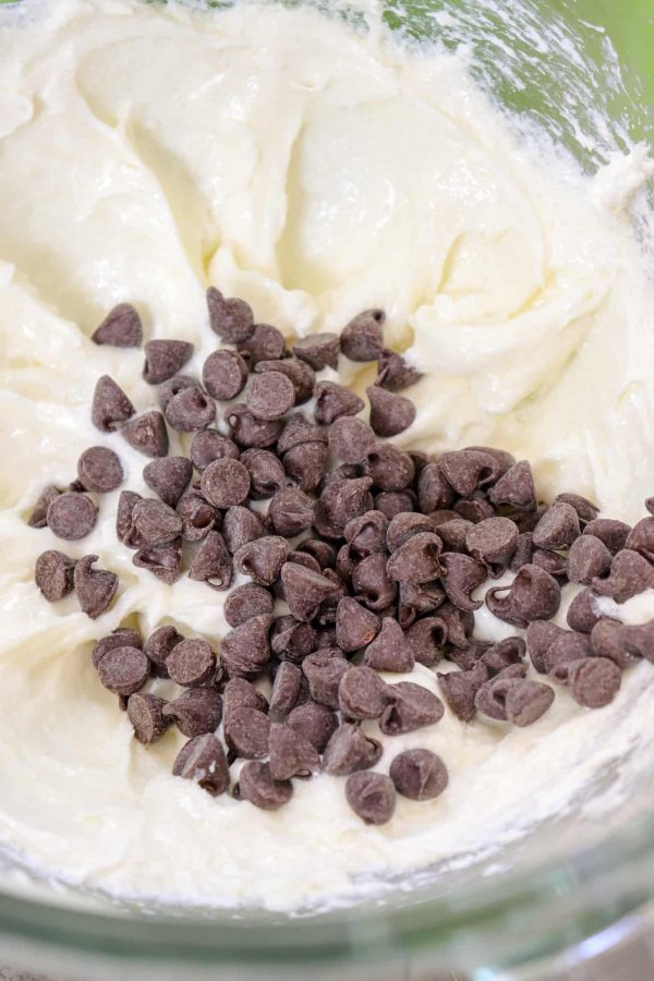 Picture of chocolate chips with cream cheese and sugar.