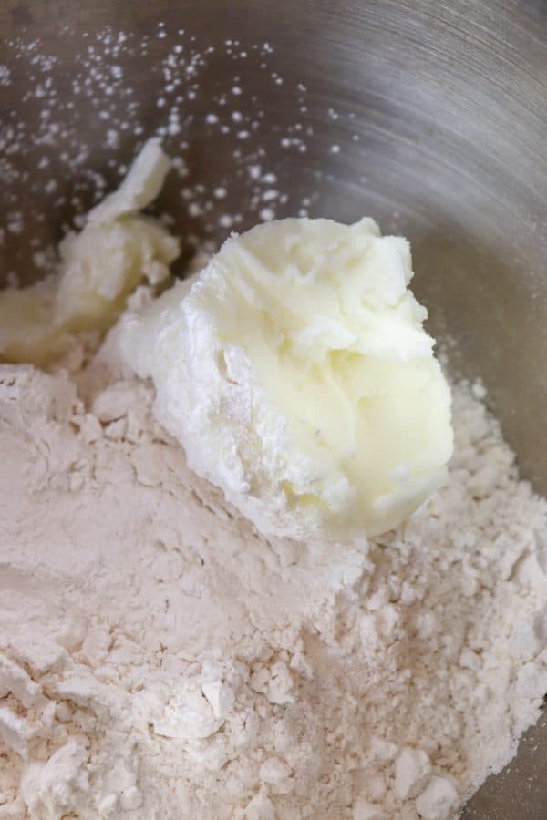 Picture of shortening in a bowl of flour. 