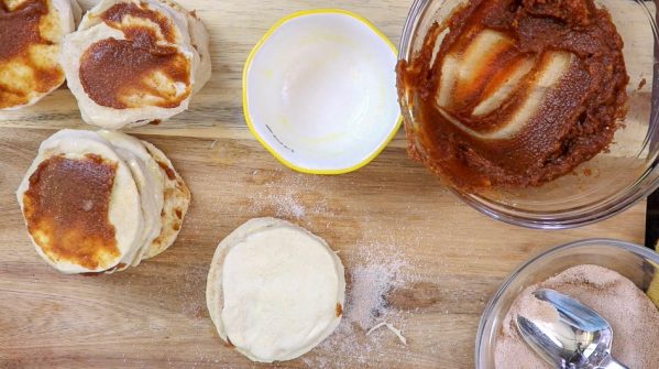 Picture of canned biscuits, pumpkin puree mix and sugar cinnamon mixture.