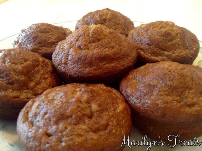 Picture of apple cinnamon muffins stacked on top of each other